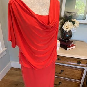 Red dress by Ronni Nicole. Figure flattering style